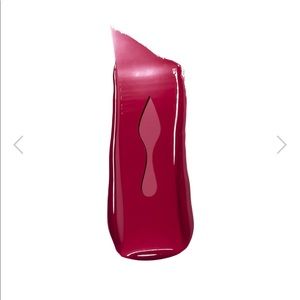 Christian Louboutin rouge lip gloss.